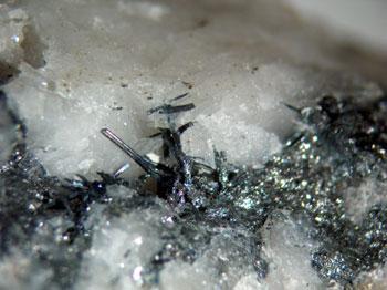 Meneghinite