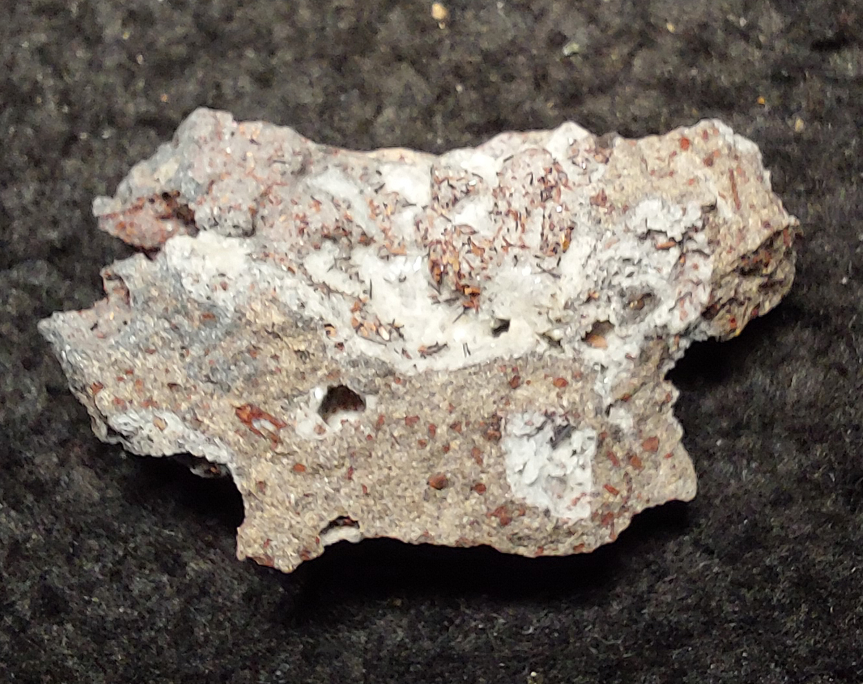 Pseudobrookite Enstatite Fluorapatite & Hematite