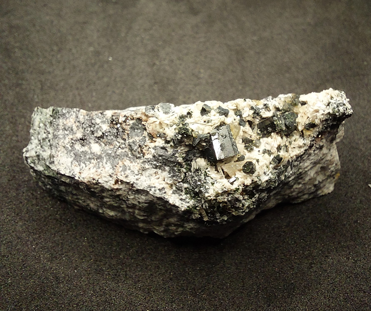 Magnesio-hornblende Calcite Magnetite Fluorapatite & Albite