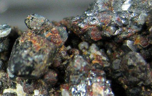 Hematite With Cassiterite Tridymite & Yazganite