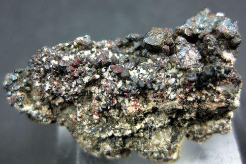 Hematite With Cassiterite Tridymite & Yazganite