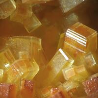 Thomsenolite