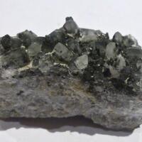 Tochilinite Calcite Magnetite & Pyrite