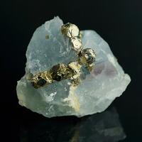 Pyrite On Fluorite