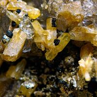 Zircon Pyrophanite On Smoky Quartz