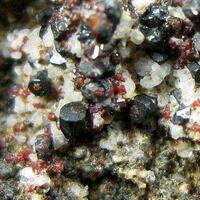 Hematite With Cassiterite Tridymite & Yazganite