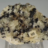 Uraninite With Fluorite On Calcite