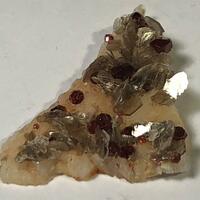 Spessartine & Muscovite On Feldspar