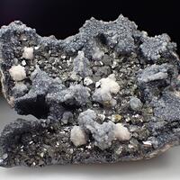 Boulangerite & Calcite & Sphalerite & Rhodochrosite