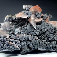 Calcite With Hematite Inclusions On Mottramite