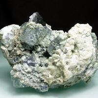 Fluorite With Bismuthinite Inclusions & Ferberite