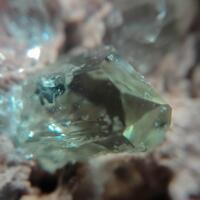 Fluorapatite Fluorophlogopite Calcite & Hematite