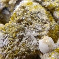 Fluoro-edenite Calcite & Pseudobrookite