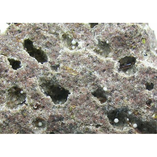 Armalcolite-Pseudobrookite Series Enstatite & Tridymite