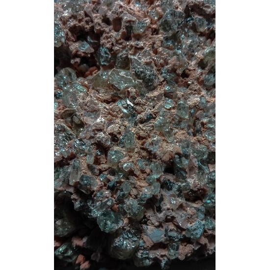 Fluorapatite Fluorophlogopite Calcite & Hematite